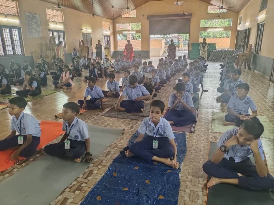 International Yoga Day session in the school hall